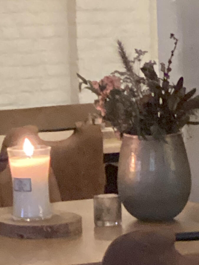 Table with lit candle